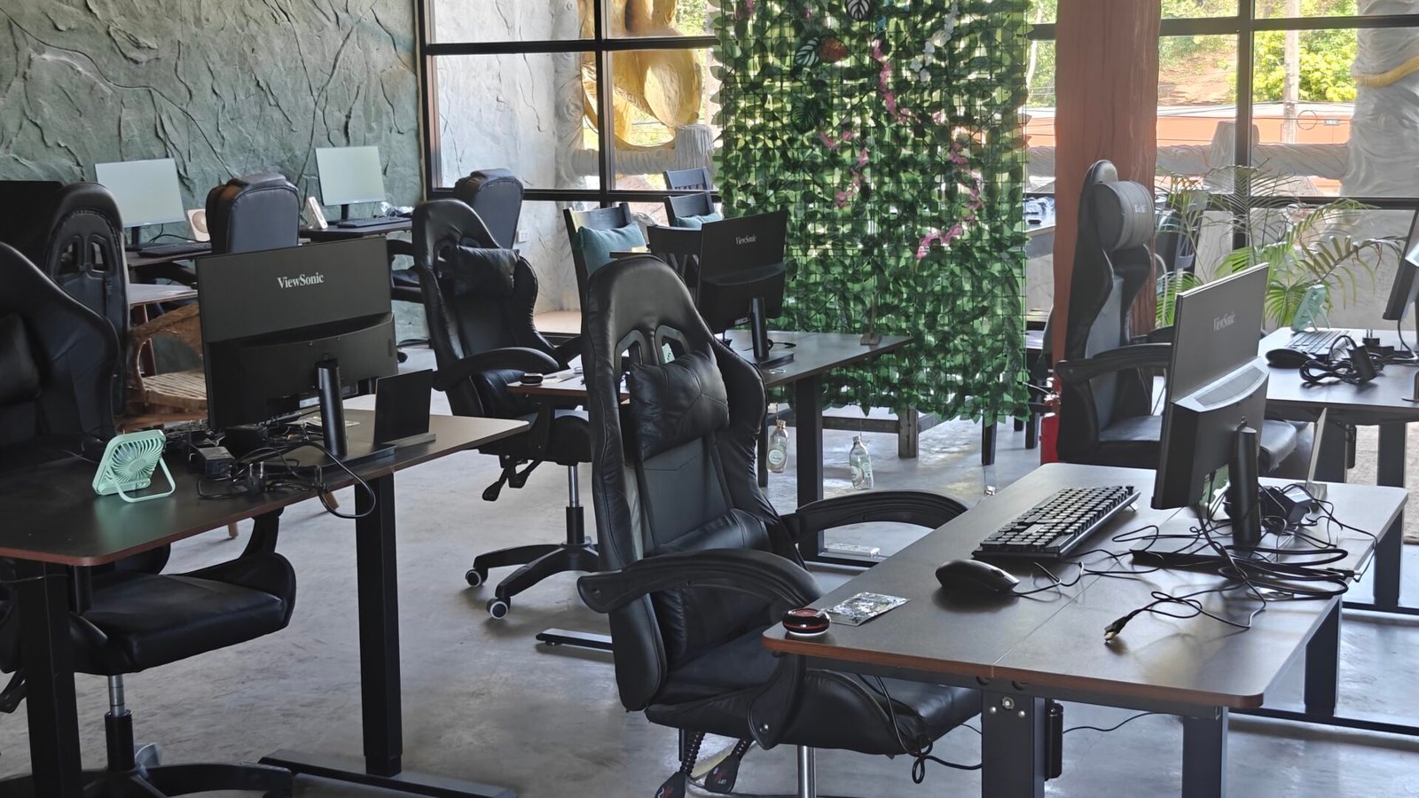 Our electronic standing desks and monitors at Monkey Business coworking space, Koh Lanta